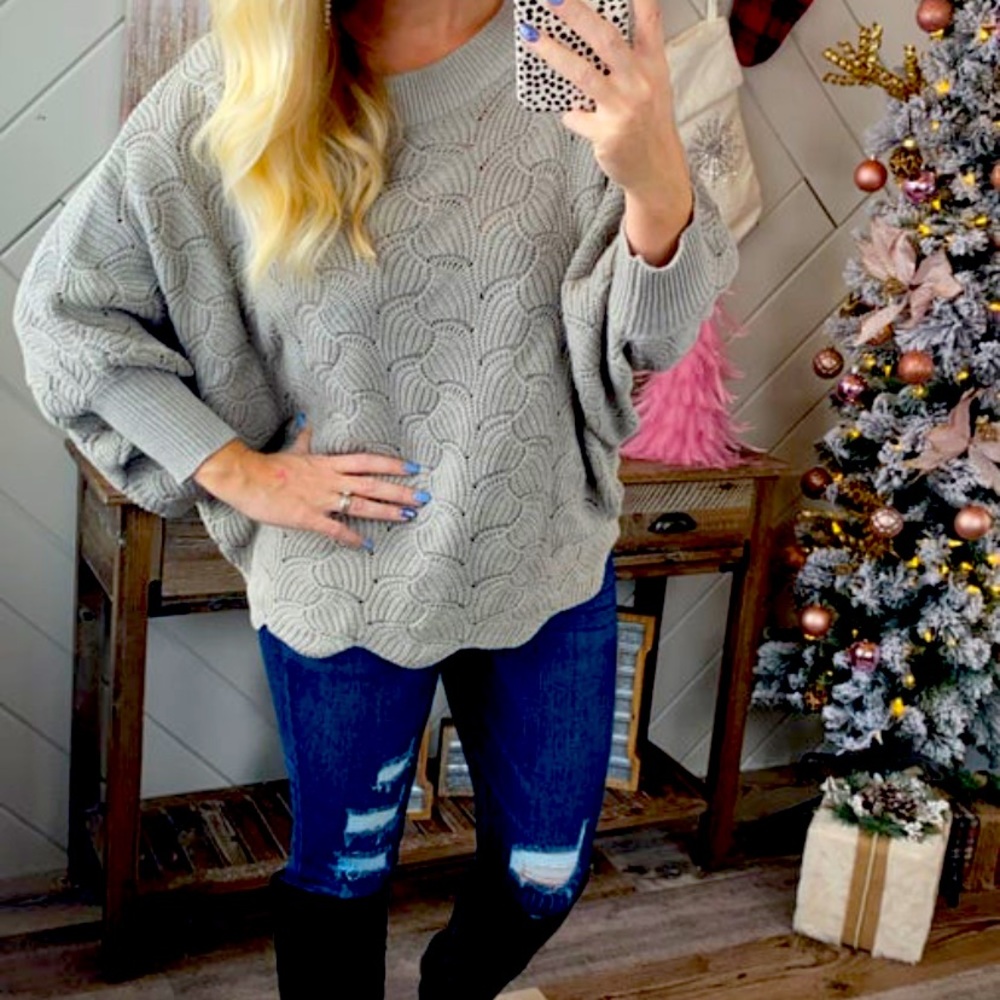 Like new-worn once, adorable dolman style knit sweater!  Color is black not gray